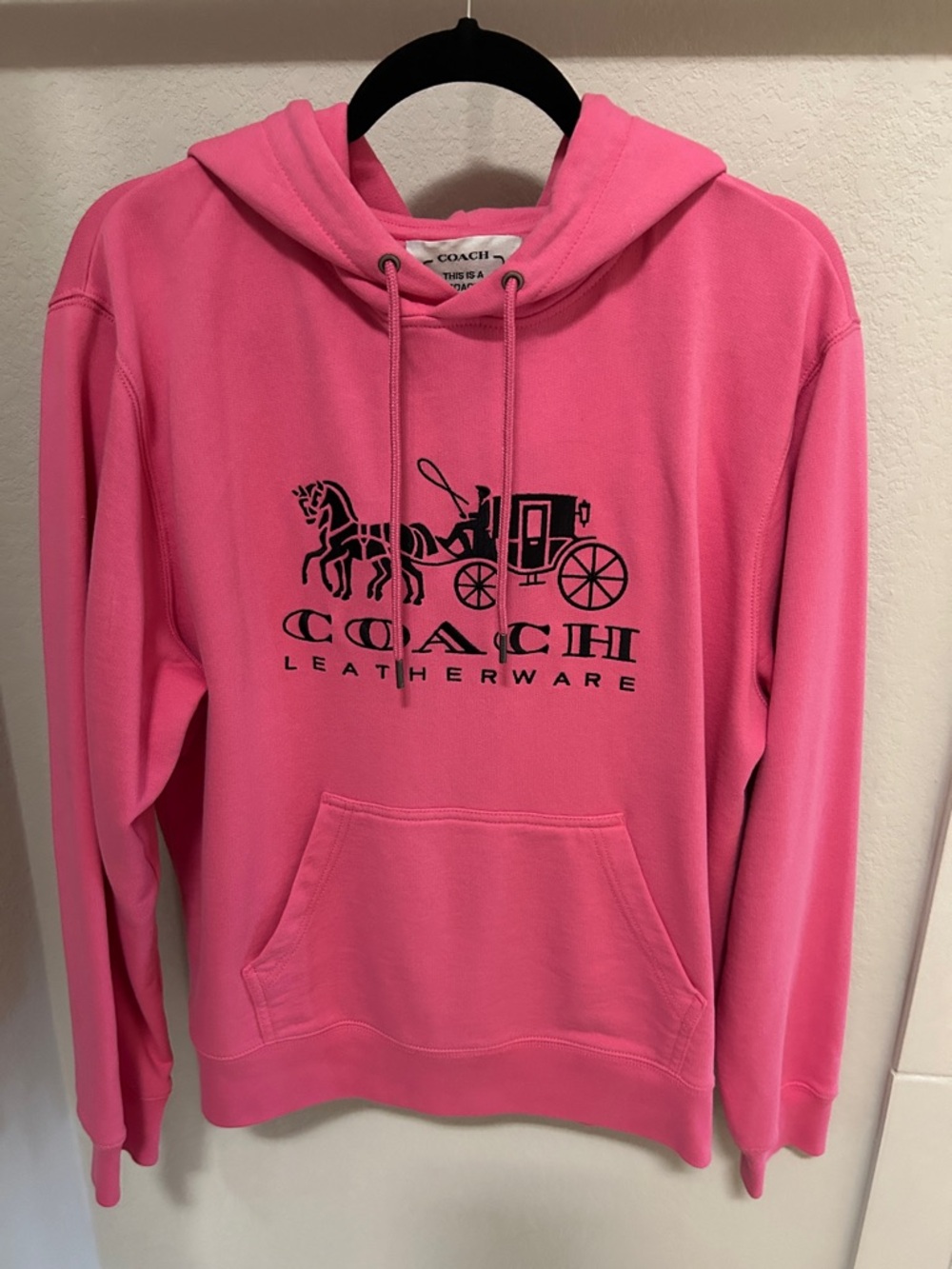 Coach Pink Hoodie with Black Carriage Logo - Women's Sweater